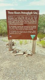 Information sign against clear sky