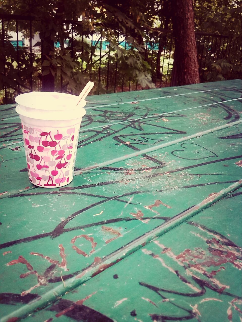 tree, table, leaf, absence, empty, day, chair, park - man made space, sunlight, no people, bench, outdoors, nature, growth, wood - material, shadow, tree trunk, close-up, front or back yard, red