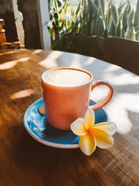 Close-up of coffee cup on table