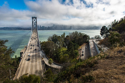 High angle view of bridge over river against buildings