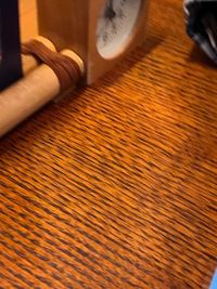 High angle view of piano keys on wooden table