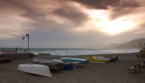 Scenic view of beach against sky during sunset