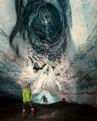 Full length of man standing on rock