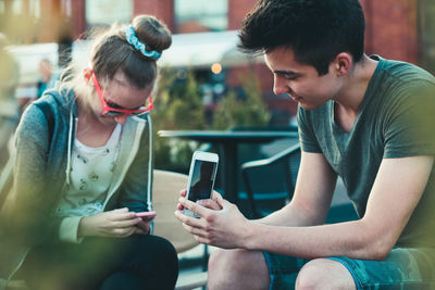 Young man using mobile phone