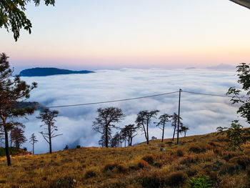 Scenic view of landscape against sky during sunset