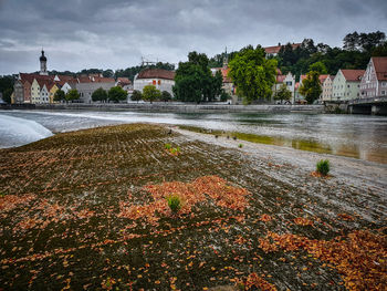 View of buildings against cloudy sky