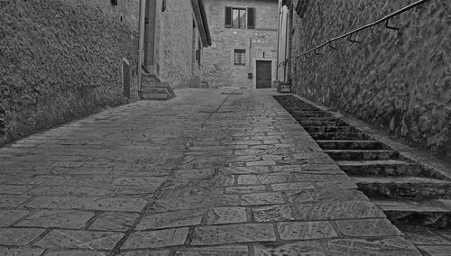 Narrow alley along buildings