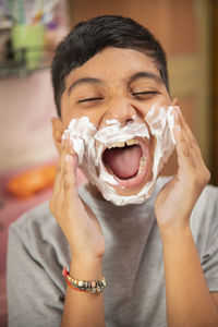 Portrait of woman eating ice cream