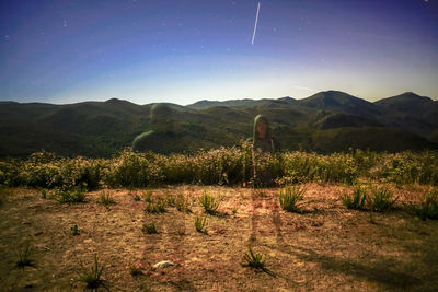 Scenic view of field against clear sky