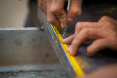 Close-up of hands working