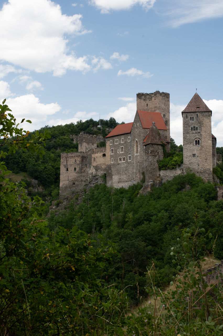 architecture, castle, building exterior, built structure, building, history, the past, château, sky, plant, nature, travel destinations, fort, tree, cloud, travel, medieval, fortified wall, tourism, land, old, no people, house, fortification, tower, residential district, ancient, outdoors, wall, landscape, mansion, ruins, mountain, day, rural area, home, holiday, scenics - nature, low angle view