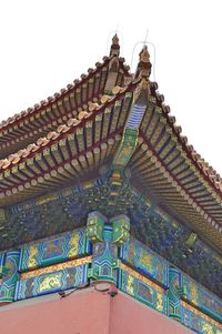 Low angle view of ornate building against sky