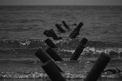 Close-up of metal structure on beach