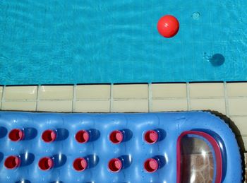 High angle view of red ball on swimming pool