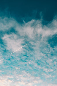 Low angle view of vapor trail in sky