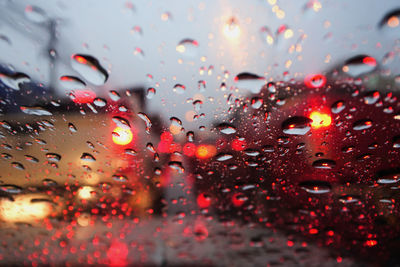 Water drops on the windshield. in the atmosphere of the road in the rain.