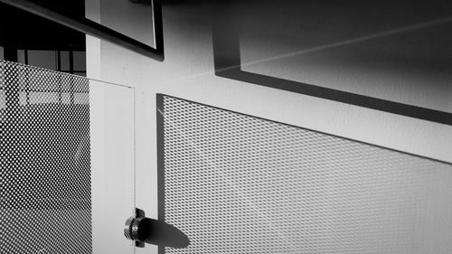 Close-up of shadow on tiled floor