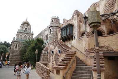 Group of people in temple against building