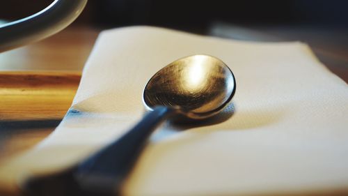 Close-up of spoon on table