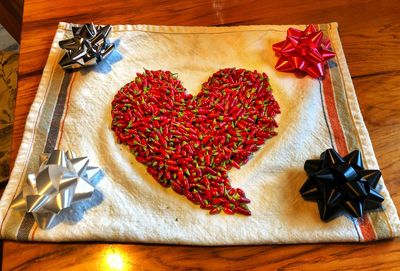 High angle view of strawberries on cutting board