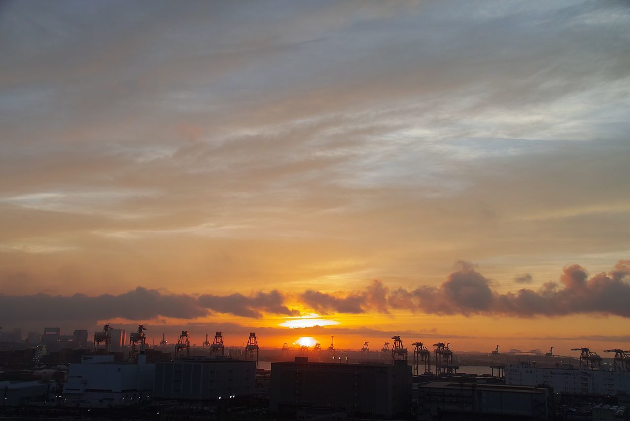 sky, sunset, cloud - sky, architecture, building exterior, orange color, built structure, nature, beauty in nature, city, building, cityscape, no people, scenics - nature, residential district, outdoors, sunlight, sun, high angle view, silhouette, romantic sky