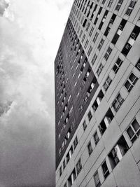 Low angle view of office building against sky