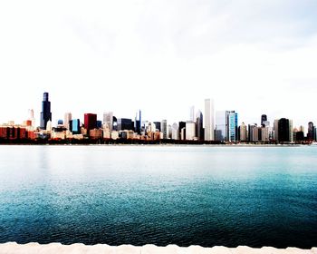 Lake michigan against modern buildings in city