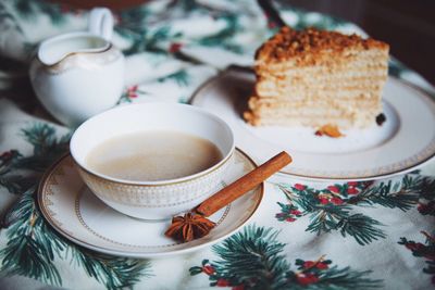 Close-up of tea cup and cake