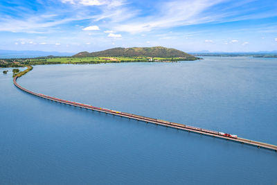 The train passes through the dam