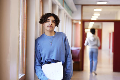 Teenage boy looking at camera