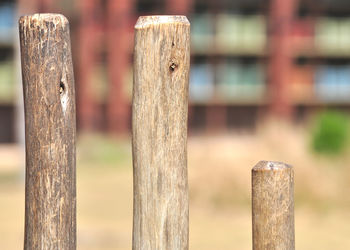 Close-up of wooden post on fence