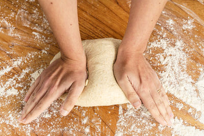 High angle view of woman preparing food