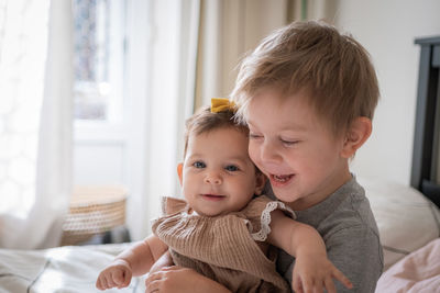 Close-up of cute baby girl at home