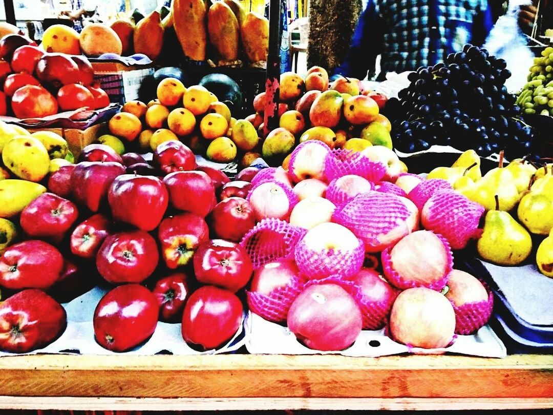 FRUITS FOR SALE AT MARKET STALL