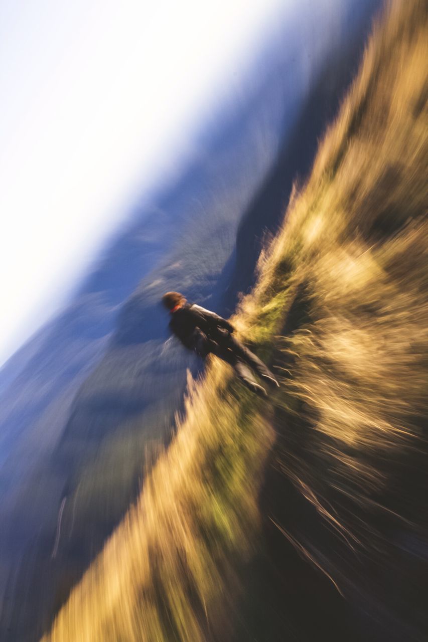 blurred motion, motion, speed, sky, nature, no people, transportation, day, outdoors, long exposure, mode of transportation, beauty in nature, leisure activity, flying, defocused, environment, scenics - nature, travel