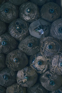 Directly above shot of water bottles wrapped in jute