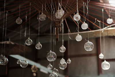 Low angle view of illuminated chandelier