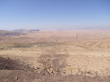 Scenic view of desert against clear sky