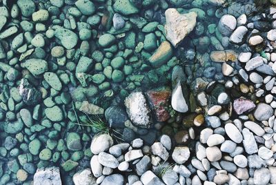 High angle view of stones on beach