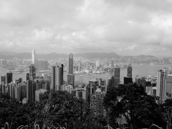 High angle view of buildings in city against sky