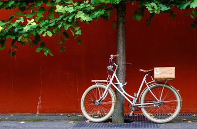 Bicycle parked on wall