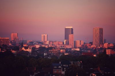 High angle view of buildings against sky during sunset