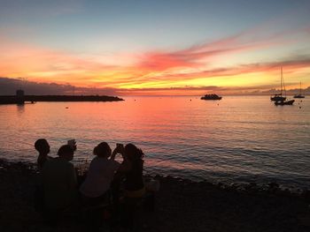 Scenic view of sea at sunset