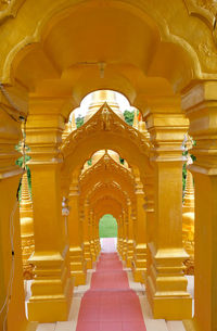 Low angle view of ceiling in temple.