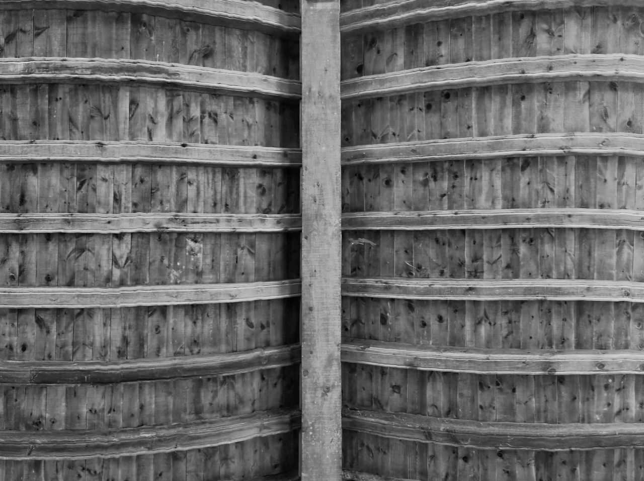 full frame, wood, no people, backgrounds, pattern, black and white, day, large group of objects, wall, in a row, monochrome photography, architecture, repetition, close-up, textured, iron, lumber, monochrome, arrangement, outdoors, abundance, built structure