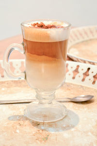 Close-up of coffee cup on table