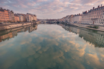 Reflection of buildings in water in lyon france