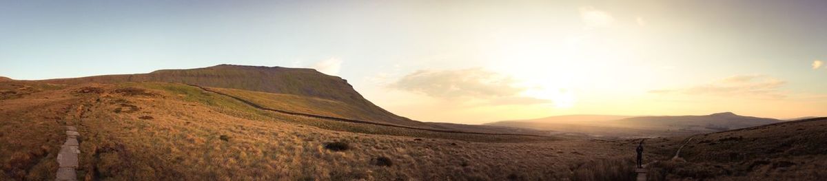 Panoramic view of landscape against sky during sunset