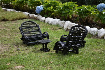 Chairs on grass in park