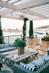 High angle view of empty chairs and table